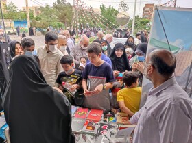 برپایی غرفه به همت اداره کتابخانه های عمومی شهرستان رباط کریم در مسیر راهپیمایی روز قدس