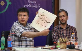 خوشنويسي از آثار نظامي در همايش ملي قلم براي قلم همدان