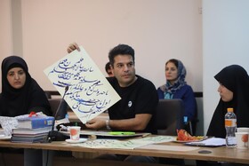 خوشنويسي از آثار نظامي در همايش ملي قلم براي قلم همدان