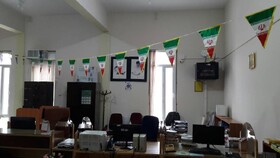 اهتزاز پرچم جمهوری اسلامی ایران در کتابخانه‌های عمومی آذربایجان غربی