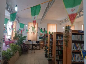 اهتزاز پرچم جمهوری اسلامی ایران در کتابخانه‌های عمومی آذربایجان غربی