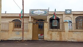 اهتزاز پرچم جمهوری اسلامی ایران در کتابخانه‌های عمومی آذربایجان غربی