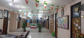 برافراشته شدن پرچم مقدس جمهوری اسلامی ایران در کتابخانه های عمومی کرمان