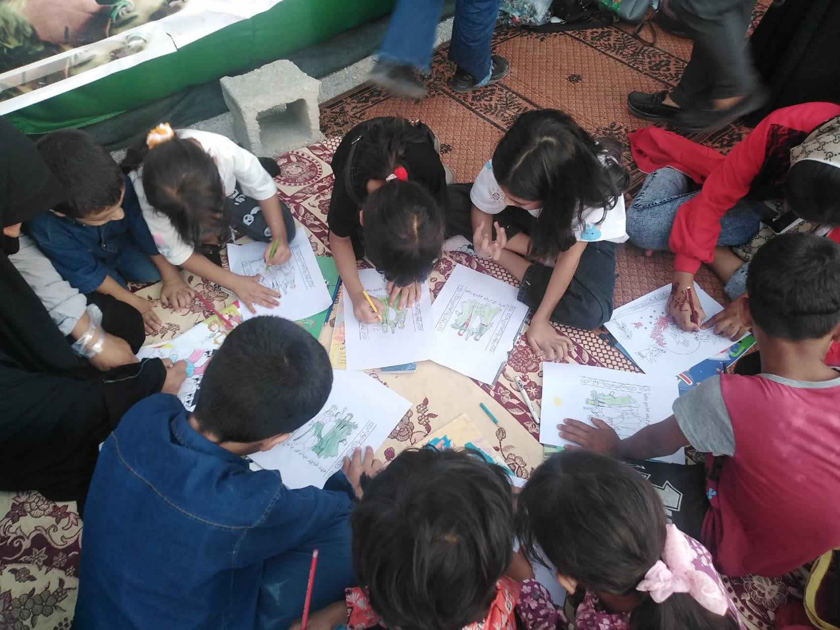 برپایی ایستگاه صلواتی فرهنگی توسط اداره کتابخانه های عمومی شهرستان حاجی آباد 