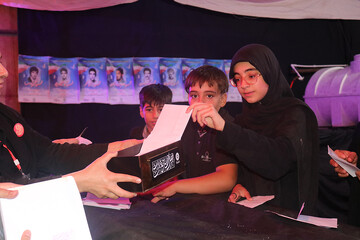 اجرای پویش زیارت نیابتی شهدا موکب فرهنگی- خدماتی اداره کل کتابخانه های عمومی استان ایلام