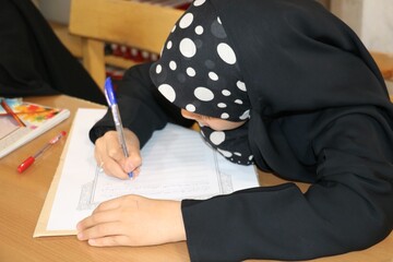 کتابت کلام وحی در کتابخانه مرکزی کرمان