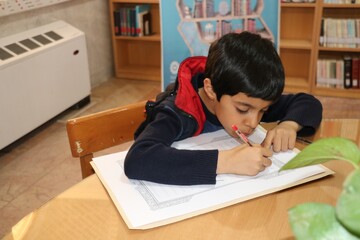 کتابت کلام وحی در کتابخانه مرکزی کرمان