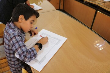 کتابت کلام وحی در کتابخانه مرکزی کرمان