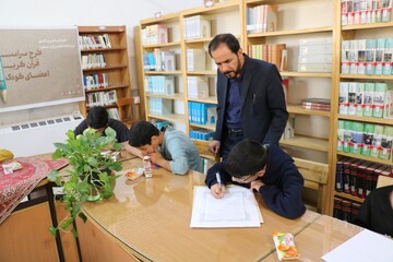 کتابت کلام وحی در کتابخانه مرکزی کرمان