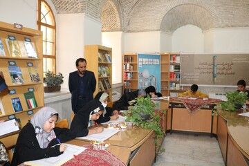 کتابت کلام وحی در کتابخانه مرکزی کرمان