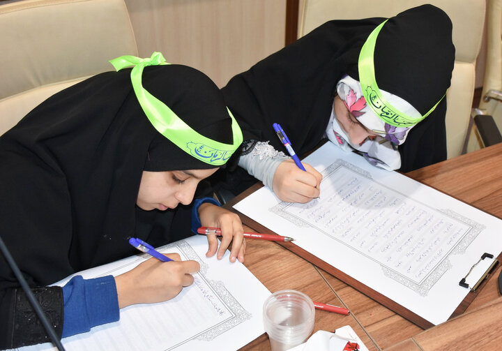 آیین سراسری کتابت قرآن کریم در آستان مطهر حضرت احمدبنموسی شاهچراغ (ع) برگزار شد