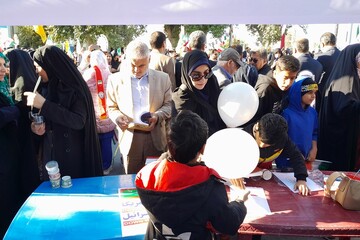 حضور کتابداران استان بوشهر در راهپیمایی یوم الله ۲۲ بهمن و برپایی غرفه های فرهنگی