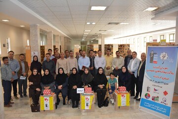 اهدای کتاب قلم چی کرمانشاه