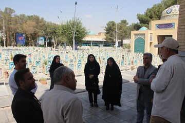 غبارروبی و عطرافشانی مزار شهدا