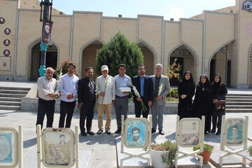 غبارروبی و عطرافشانی مزار شهدا