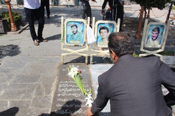 غبارروبی و عطرافشانی مزار شهدا