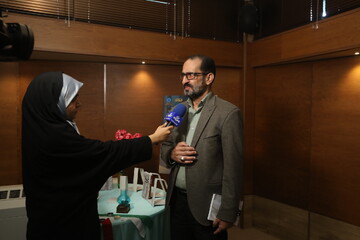  علی دخانچی برادر شهید-نشست معرفی و بررسی کتاب «تب ناتمام» در کتابخانه مرکزی پارک شهر