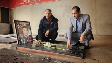 غبارروبی و عطرافشانی گلزار شهدای زنجان