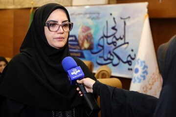 آزاده نظربلند-دبیرکل نهاد کتابخانه های عمومی کشور-محفل سراسری شعرخوانی"نیمکت های آسمانی"در کتابخانه مرکزی پارک شهر