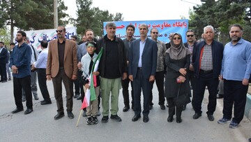 حضور مدیرکل و کارکنان کتابخانه‌های عمومی استان کرمانشاه در رزمایش سراسری«جانفدا برای ایران امام رضایی»