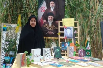 برپایی غرفه کتابخانه عمومی علامه طباطبائی(ره) روستای دشت در یادواره شهدای سه روستا