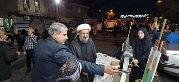 میز خدمت و برنامه‌های فرهنگی کتابخانه‌های عمومی پلدختر در تجمعات شبانه مردمی محرم