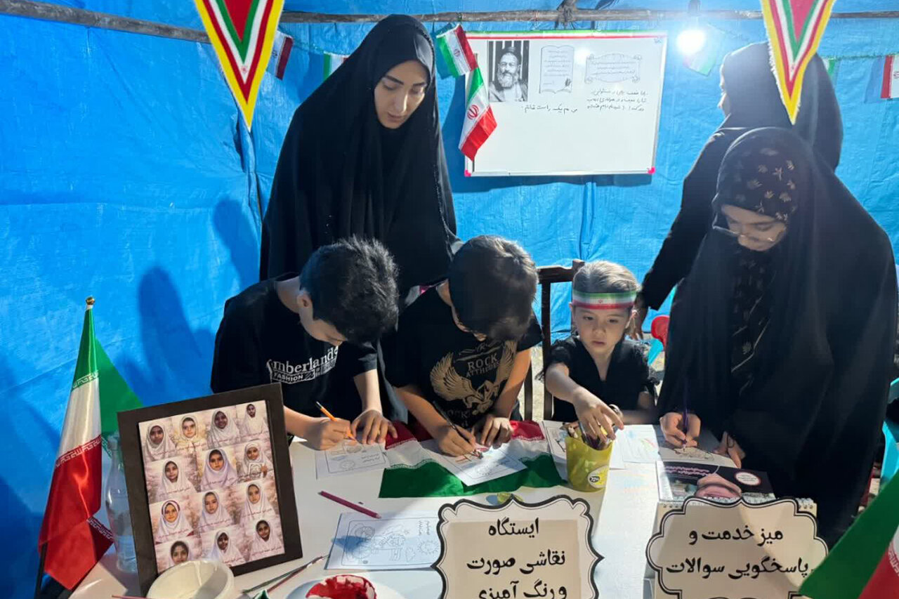 بزرگداشت شهدای هفتم تیر در غرفه فرهنگی کتابخانه‌های عمومی آشتیان