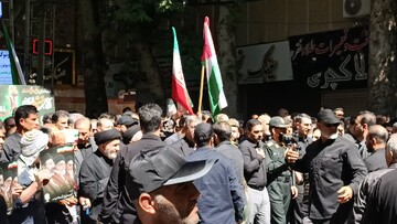 حضور مدیرکل و کارکنان کتابخانه‌های عمومی لرستان در مراسم وداع آقای شهید ایران