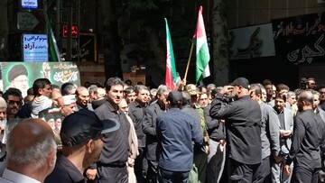 حضور مدیرکل و کارکنان کتابخانه‌های عمومی لرستان در مراسم وداع آقای شهید ایران