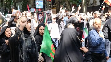 حضور مدیرکل و کارکنان کتابخانه‌های عمومی لرستان در مراسم وداع آقای شهید ایران