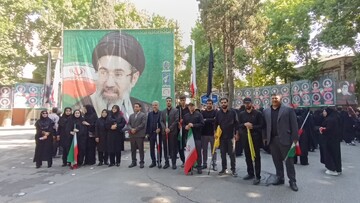 حضور مدیرکل و کارکنان کتابخانه‌های عمومی لرستان در مراسم وداع آقای شهید ایران
