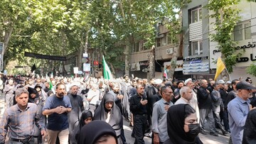 حضور مدیرکل و کارکنان کتابخانه‌های عمومی لرستان در مراسم وداع آقای شهید ایران