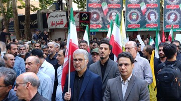 حضور مدیرکل و کارکنان کتابخانه‌های عمومی لرستان در مراسم وداع آقای شهید ایران