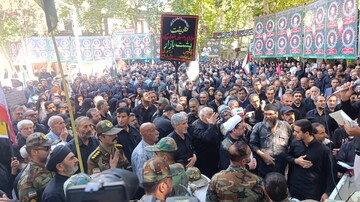 حضور مدیرکل و کارکنان کتابخانه‌های عمومی لرستان در مراسم وداع آقای شهید ایران