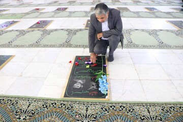 عطرافشانی مزار شهدا