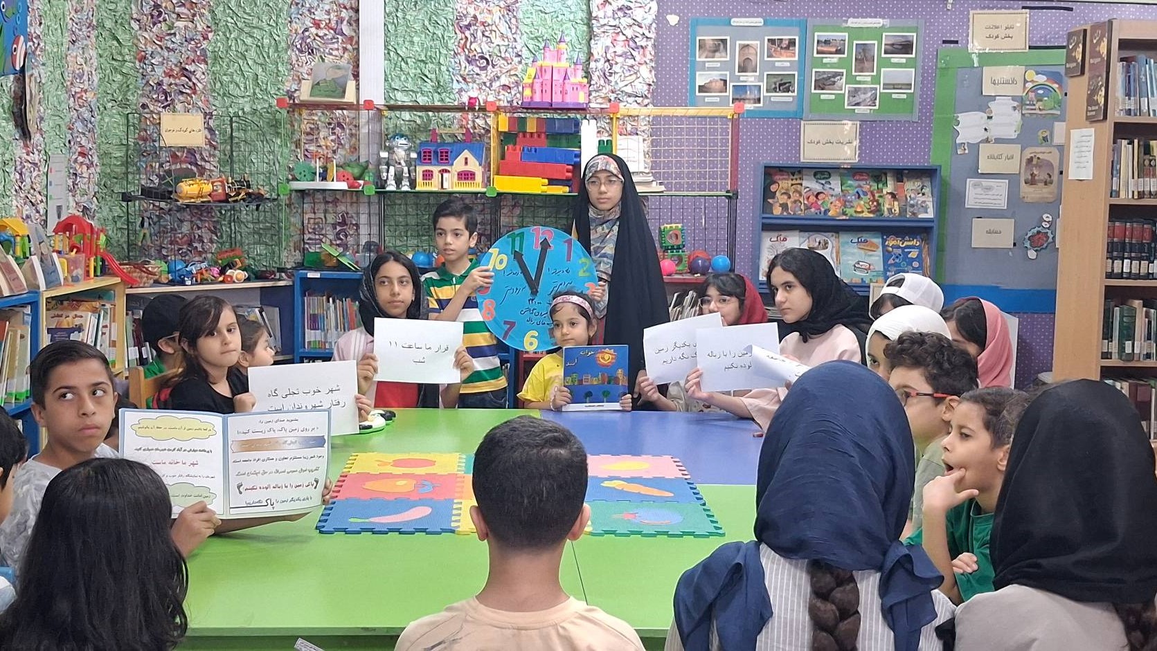 برگزاری برنامه فرهنگی‌ آموزشی «یک قصه، یک قرار، یک زمین پاک» در کتابخانه عمومی ولایت اهواز