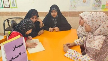 گرامیداشت یاد شهدای مدرسه شجره طیبه در کتابخانه عمومی میناب