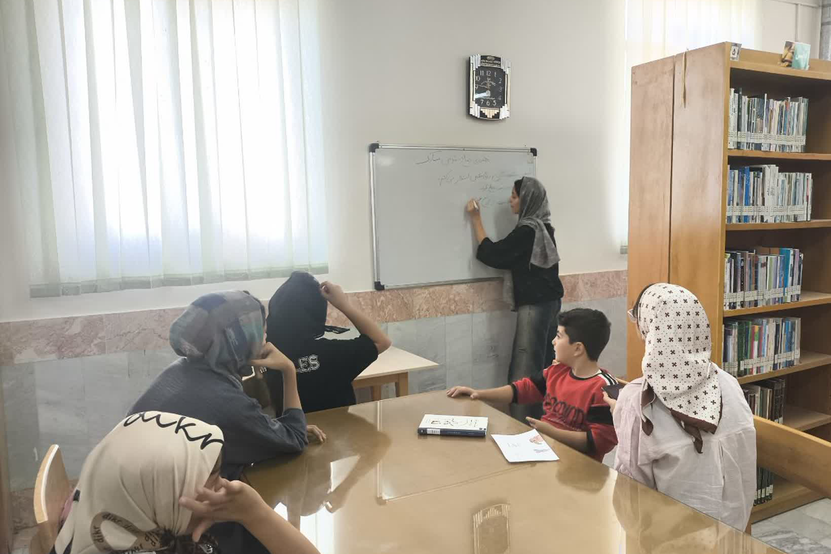 گرامیداشت هفته دفاع مقدس در کتابخانه شهدای روستای خیرآباد اراک