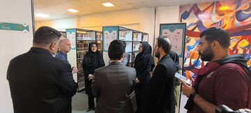 بازدید سر مربی تیم فرهنگی ورزشی خیبر خرم آباد از کتابخانه مرکزی خرم آباد